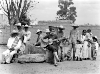 Concha Michel with Campesinos, Mexico, c.1927 by Tina Modotti